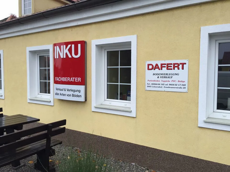 Betriebsfassade mit Dafert- und INKU-Schild